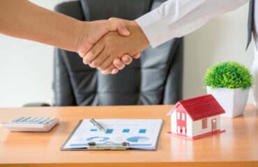 hands-agent-client-shaking-hands-after-signed-contract-buy-new-apartment