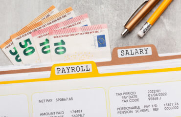 top-view-payroll-concept-with-money